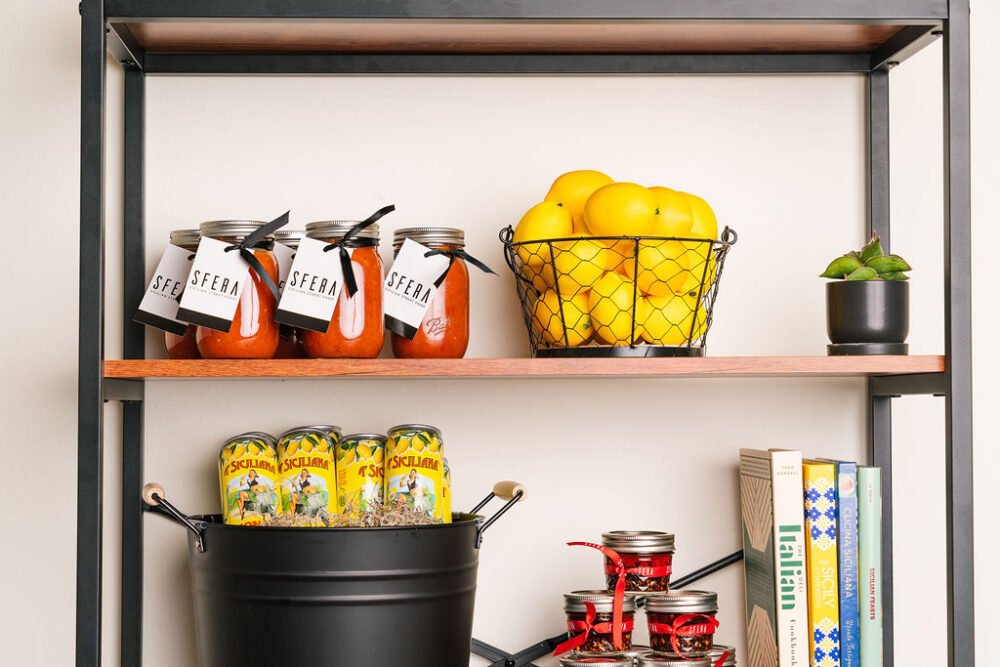 Sfera Sicilian Street Food offers a curated selection of Sicilian retail items in their restaurant both housemade and from various Italian vendors. (Photo courtesy of Kristen Mendiola) for CFM Asks: Chefs Steven Jarczyk and Daniela Vitale of Sfera Sicilian Street Food