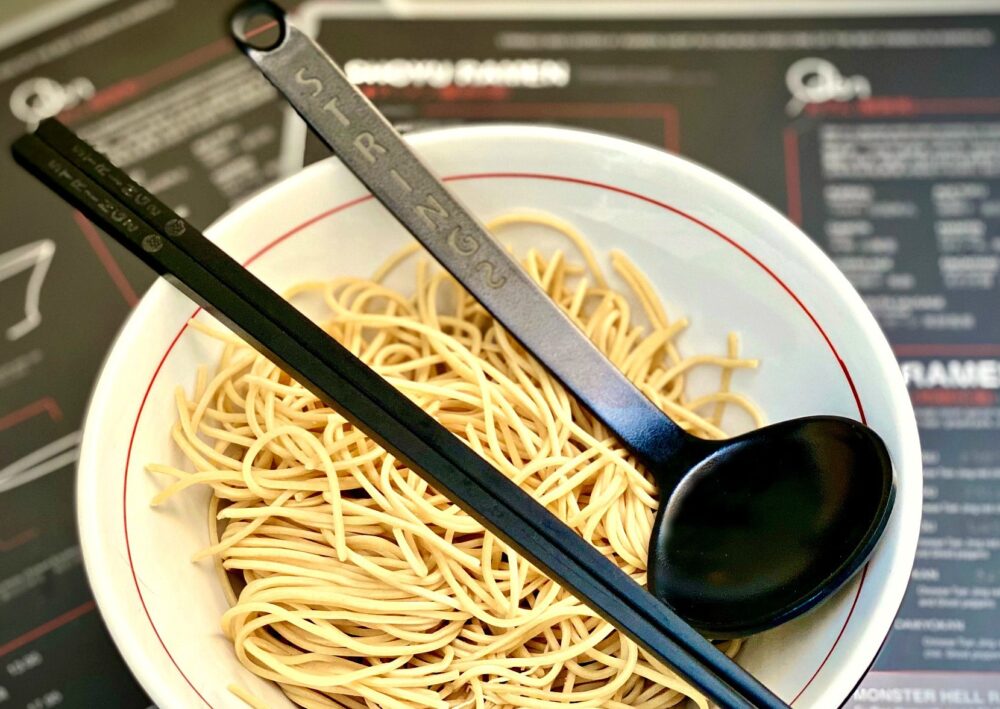 Strings celebrates National Noodle Day with free set of custom chopsticks and ramen spoon, Tuesday, Oct 6. for Free Noodle Day Swag at Strings Ramen: Tue Oct 6