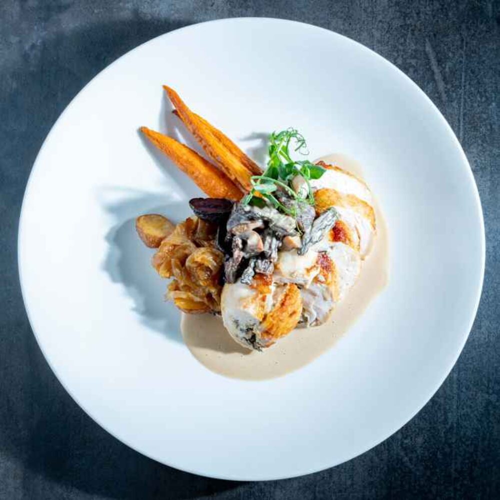 Stuffed Breast Of Hen Mushroom Stuffed Breast Of Hen Duck Fat Potatoes Roasted Baby Carrots Morel Mushroom Sauce for Bastille Day: Where to Wine and Dine on French Fare July 14th