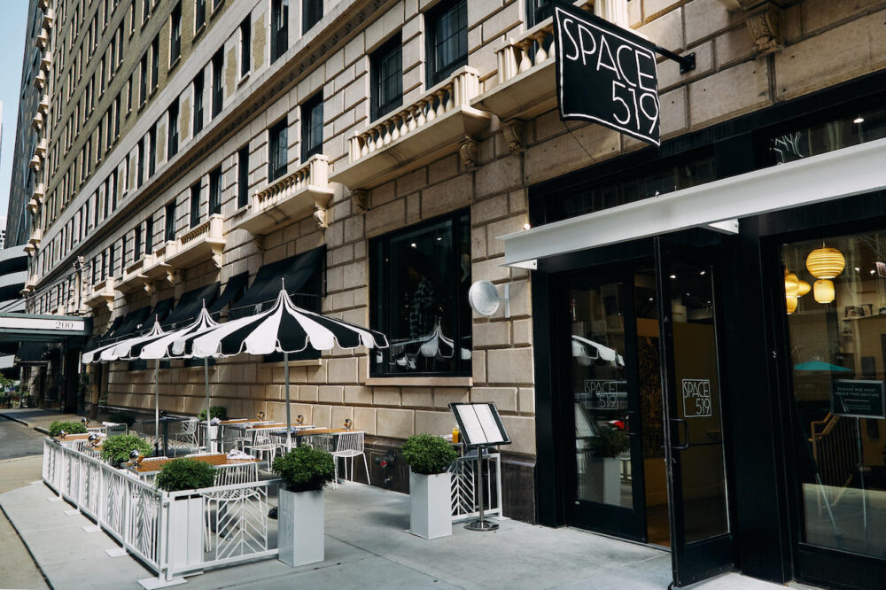 The Lunchroom At Space 519S Patio With Flag for Top Places to Dine al Fresco this Summer in Chicago