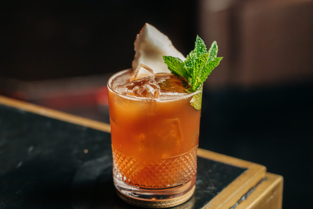 Three Dots And A Dash Coconut Midnight Stinger Cocktail 2624 for CFM's Foodie Guide to Chicago’s NASCAR Street Race Weekend 2024