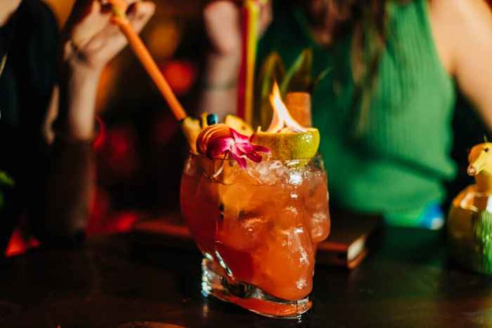 Three Dots And A Dash Zombie Group Cocktail With Aged Jamacian St Lucia Rum Overproof Rum Lime Grapefruit Cinnamon Falernum 8010 2 for Where to Find the Spookiest Deals and Parties for Halloween 2024