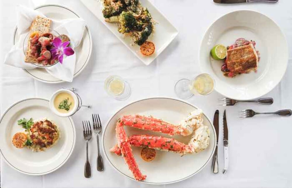 Truucks Seafood Crab Cake King Crab Legs Tuna Crudo for Hop in for Easter at these Chicago Restaurants