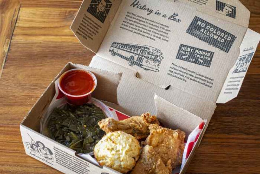 Virtue’s Shoebox Meal ($22) Fried Chicken + Collard Greens + Hot Sauce Biscuits (Photo courtesy of Lindsey Becker) for What to do in February: Celebrate Black History Month, Mardi Gras and More!
