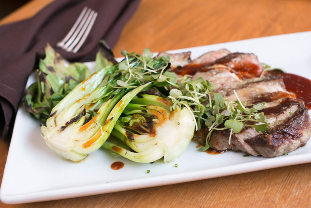 Teriyaki Ribeye with Baby Bok Choy and Wasabi Butter. Photo credit: Lindsey Becker for Ada Street Turns It Up to 11 for Chicago Restaurant Week
