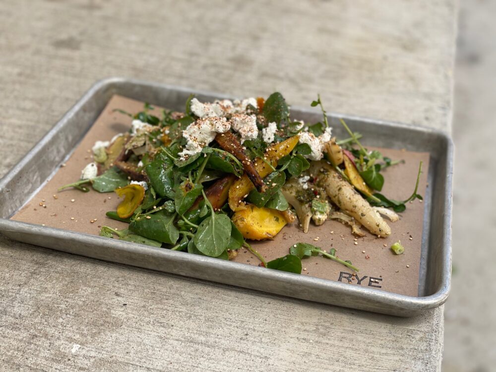 The Grilled Carrots and Watercress Salad that will launch on July 2. (Photo courtesy of Rye Deli + Drink) for Rye Deli + Drink Debuts Bagel Breakfast Sandwiches, New Menu Items