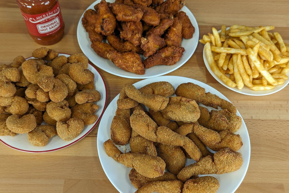 Lawrence’s frog legs, shrimp, and chicken. Photo credits: Kelley Whalen for Lawrence’s Fish & Shrimp to Celebrate a Food Holiday that Only Arrives Every 4 Years