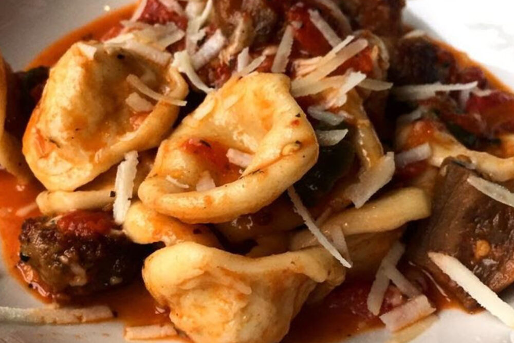 Orecchiette, Chicken Sausage, Tomato Conserva, Roasted Eggplant, Green Olives for Celebrate Easter at Osteria La Madia with an Italian Brunch or Dinner