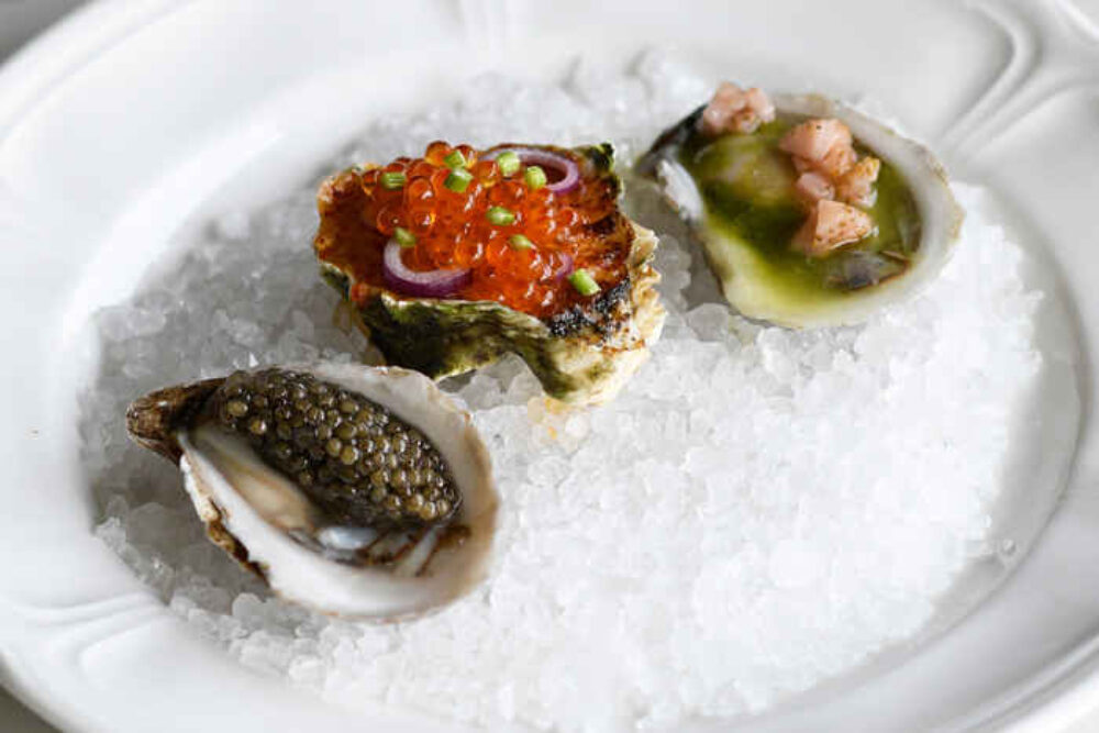 The Heritage Oyster Trio (Courtesy of Jacob DeHart) for National Oyster Day Specials at Chicago Restaurants