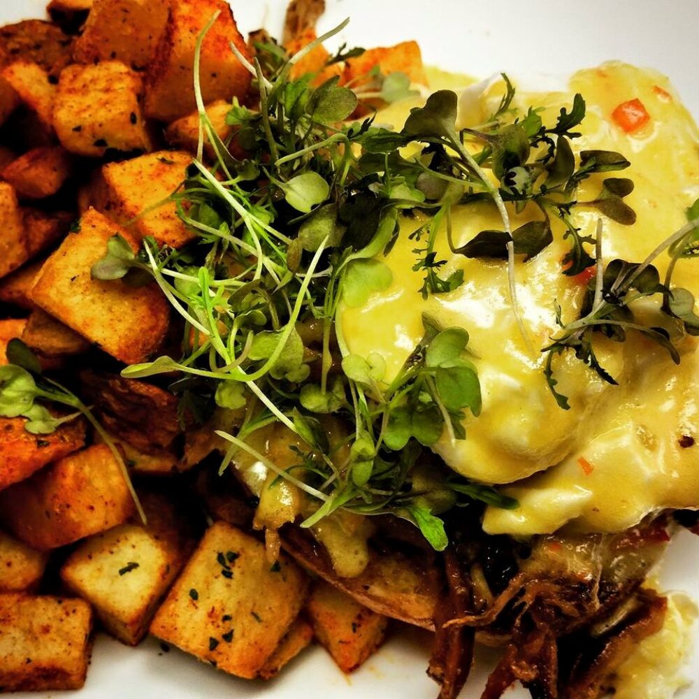 Pork Belly Benedict with giardiniera hollandaise, english muffin and home fries for Knife&Tine's Lollapalooza Pre Party Brunch