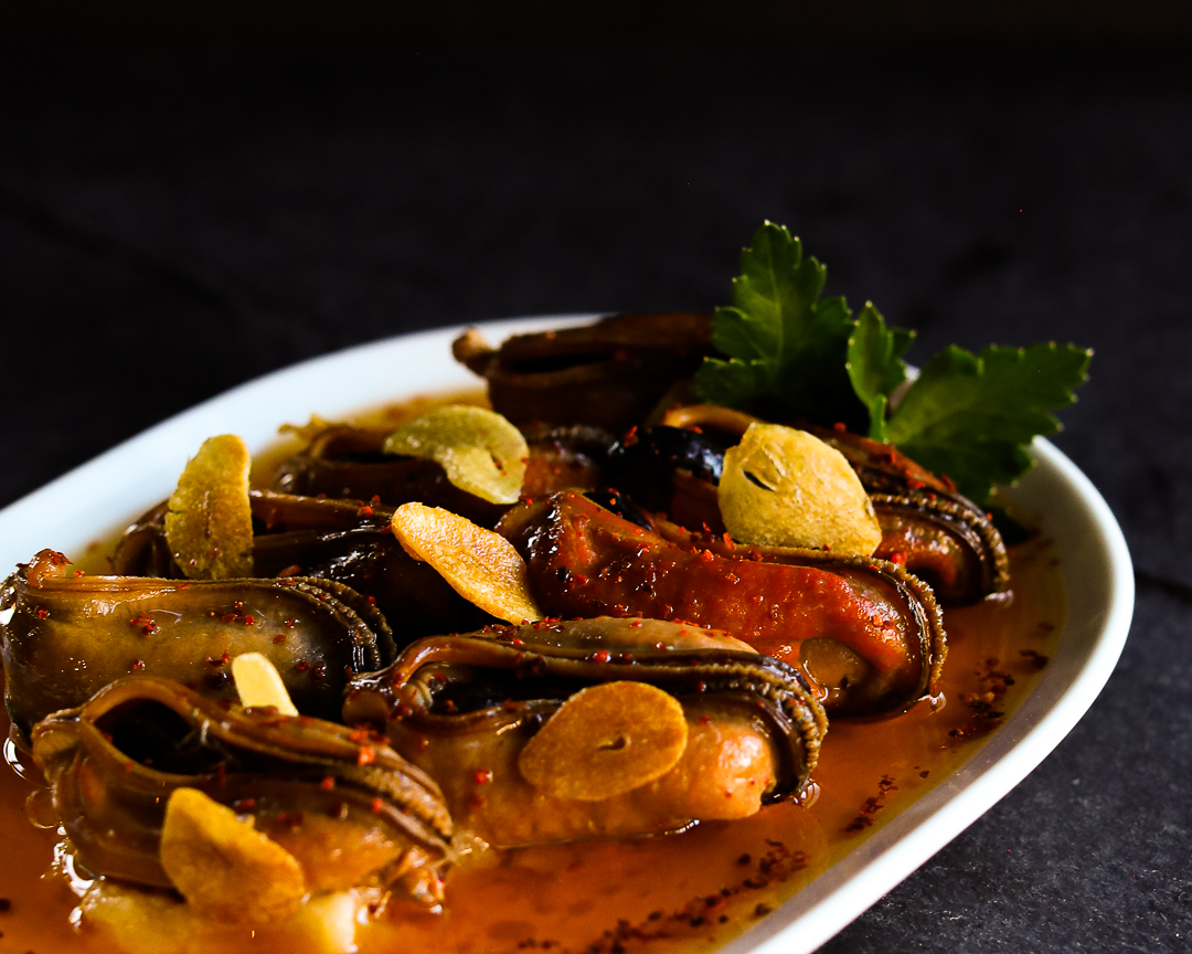 Smoked Mussel Conserva for Eat Well Hospitality's Doug Psaltis and Hsing Chen to Open Asador Bastian in March