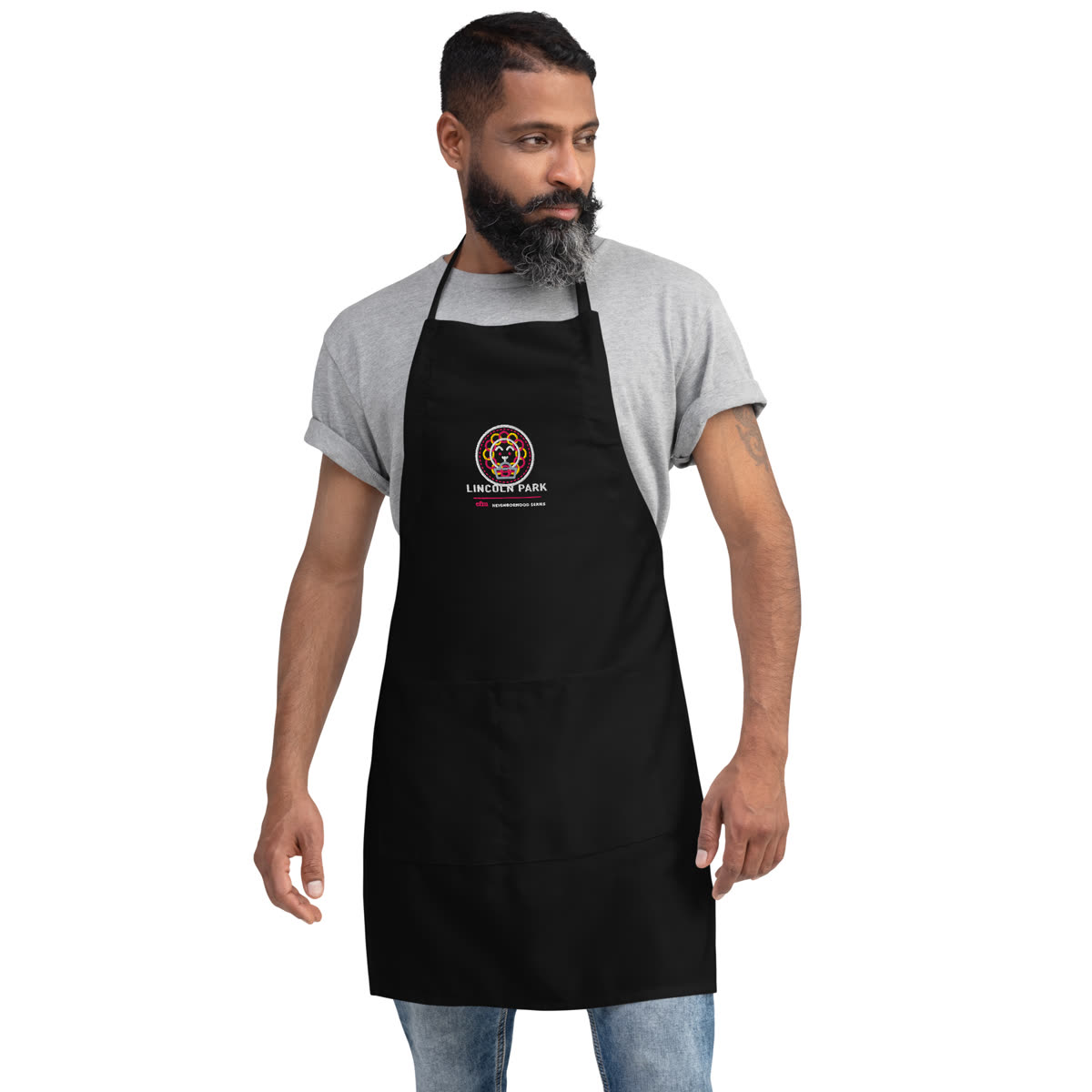 Model wearing the Lincoln Park Embroidered Chef Apron with Brunch Club artwork